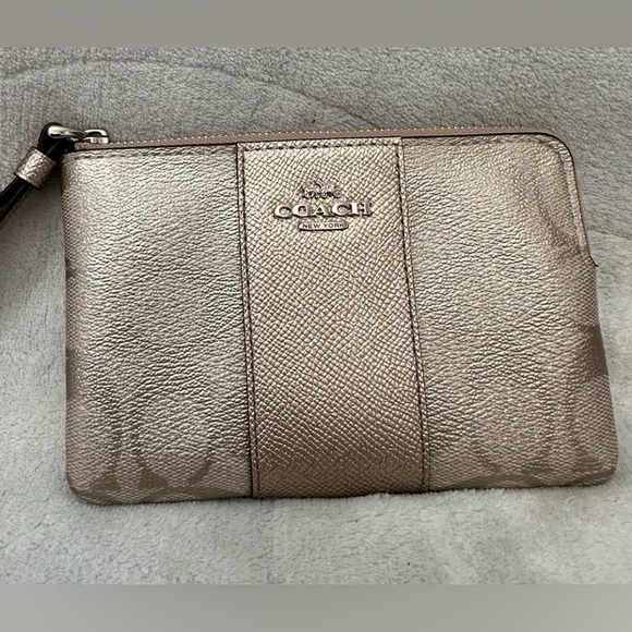 Coach Handbags - Coach monogram zip around pouch wristlet NWT.
